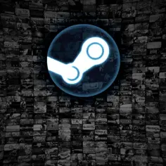 Ikona Steam na tle okładek gier. Dowiedz się, jak włączyć Steam Guard, aby zabezpieczyć swoje konto.